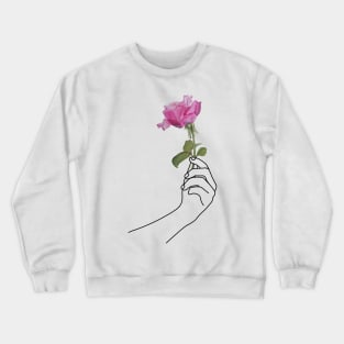 Hand holding a rose Crewneck Sweatshirt